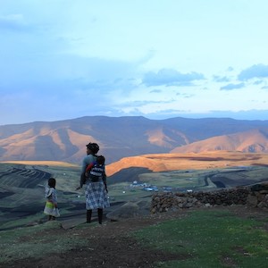 Mother and child looking at mountains