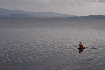 Boy fishing on lake