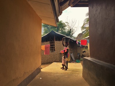 Sisters carrying water