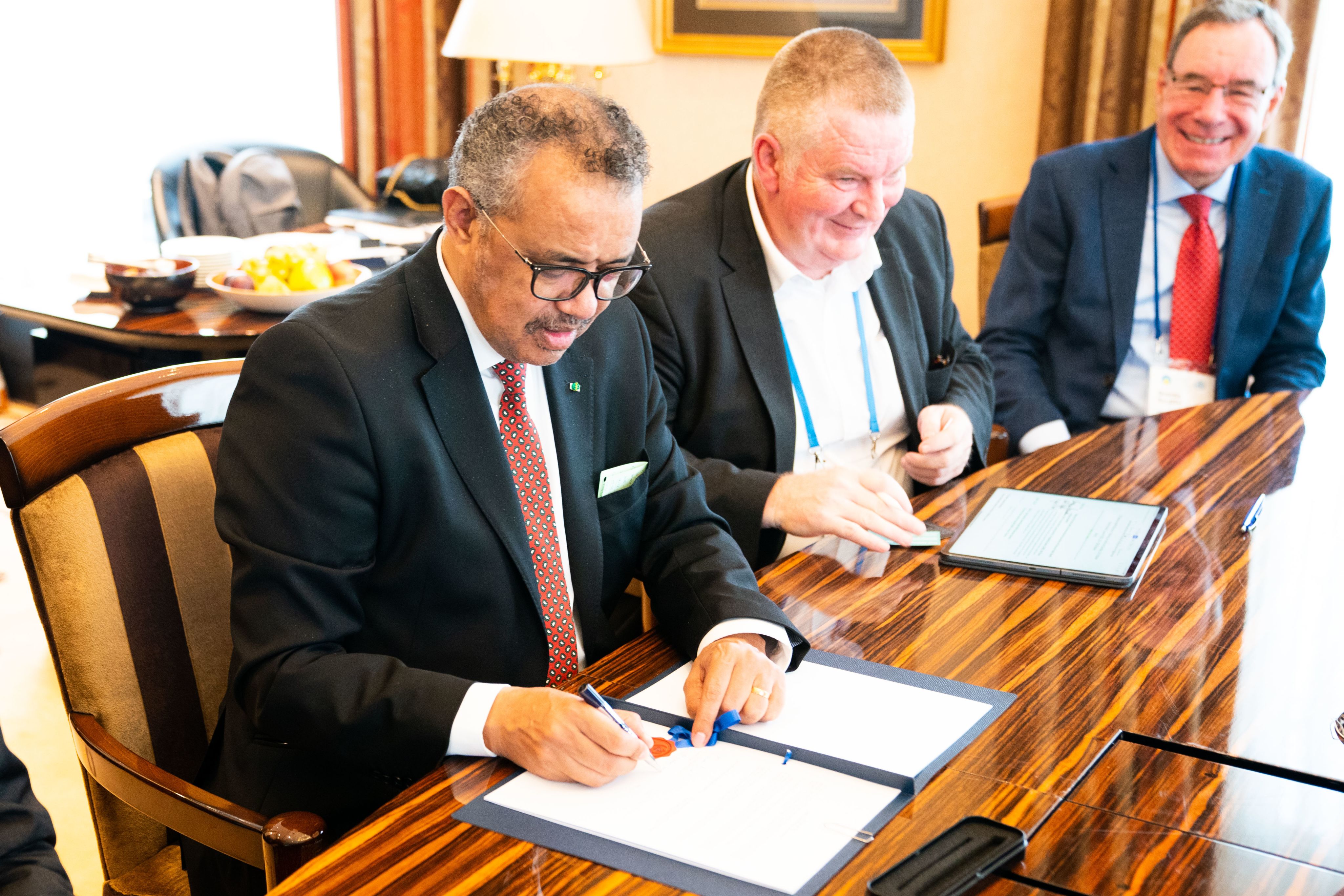Dr. Tedros signing the IANPHI-WHO MOU